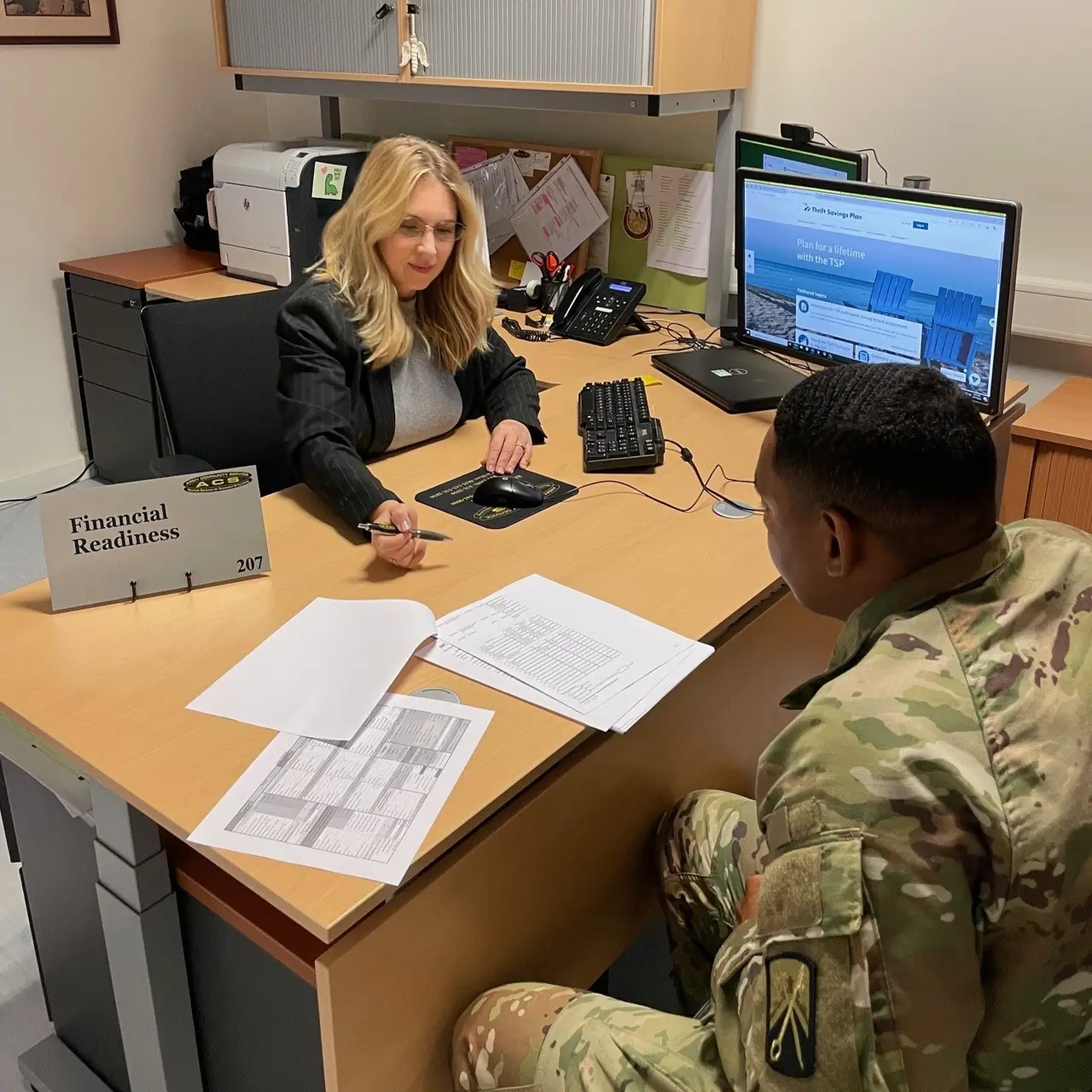 Soldier meeting a financial counselor
